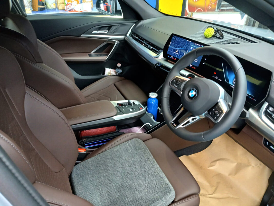 Front three-quarter view of the BMW X2 after coating.