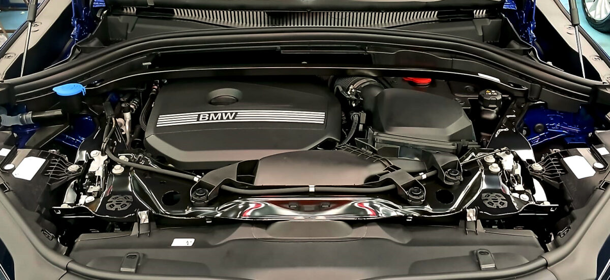 The X2's coated paintwork showing clean reflections.