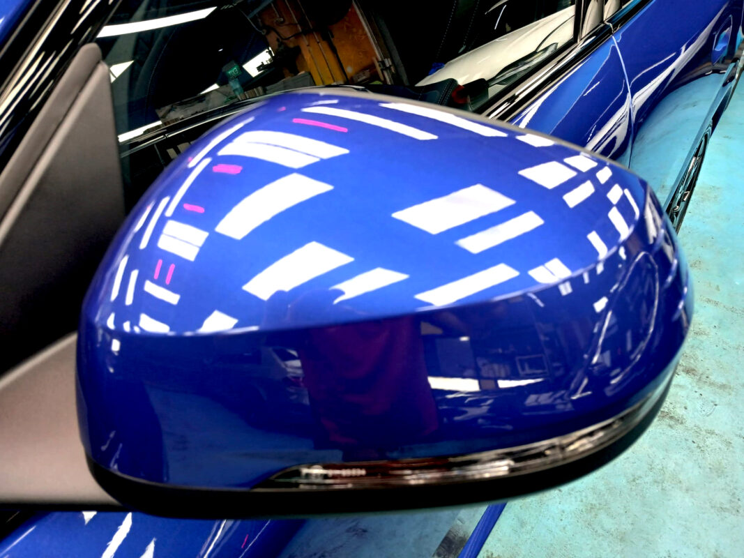 The BMW X2 parked in the workshop, freshly coated.
