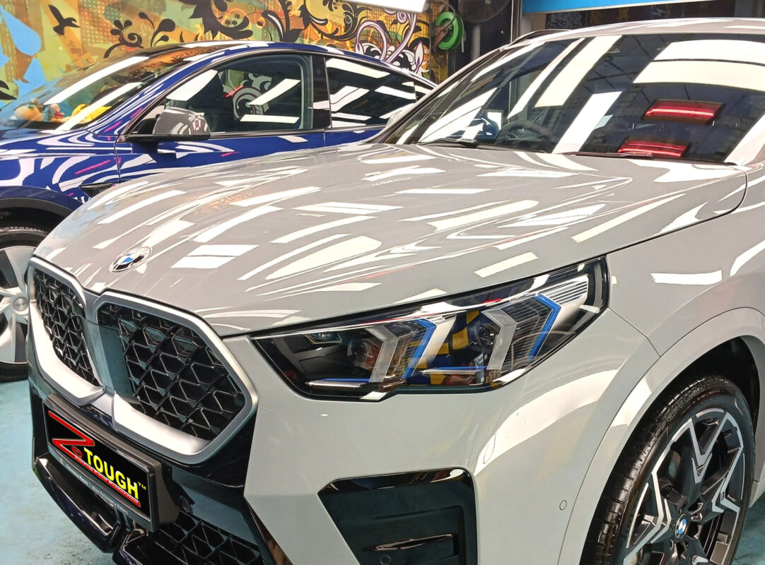 The BMW X2 from a side angle after the ceramic coating.