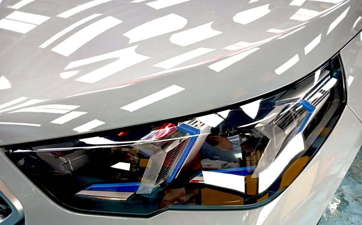 The X2's coated paintwork showing clean reflections.
