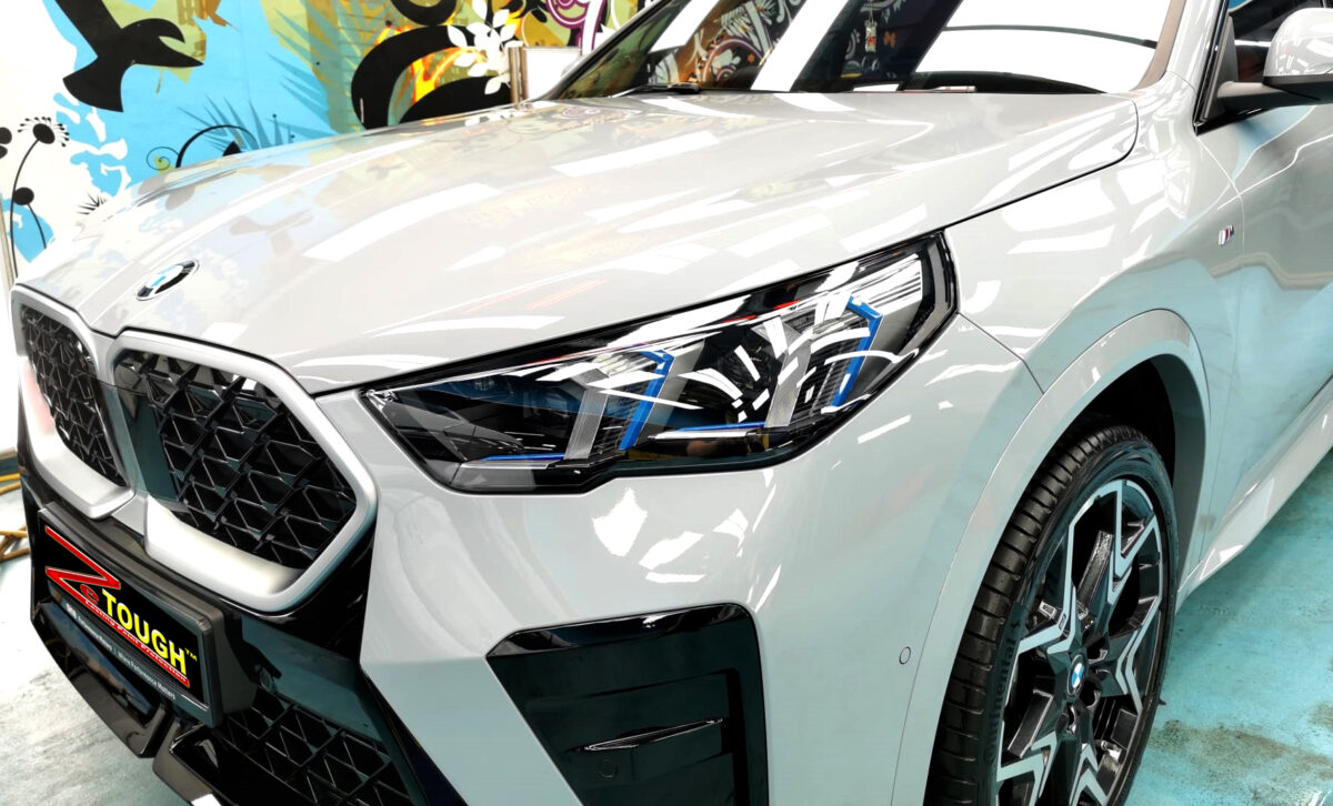 The BMW X2 from a side angle after the ceramic coating.
