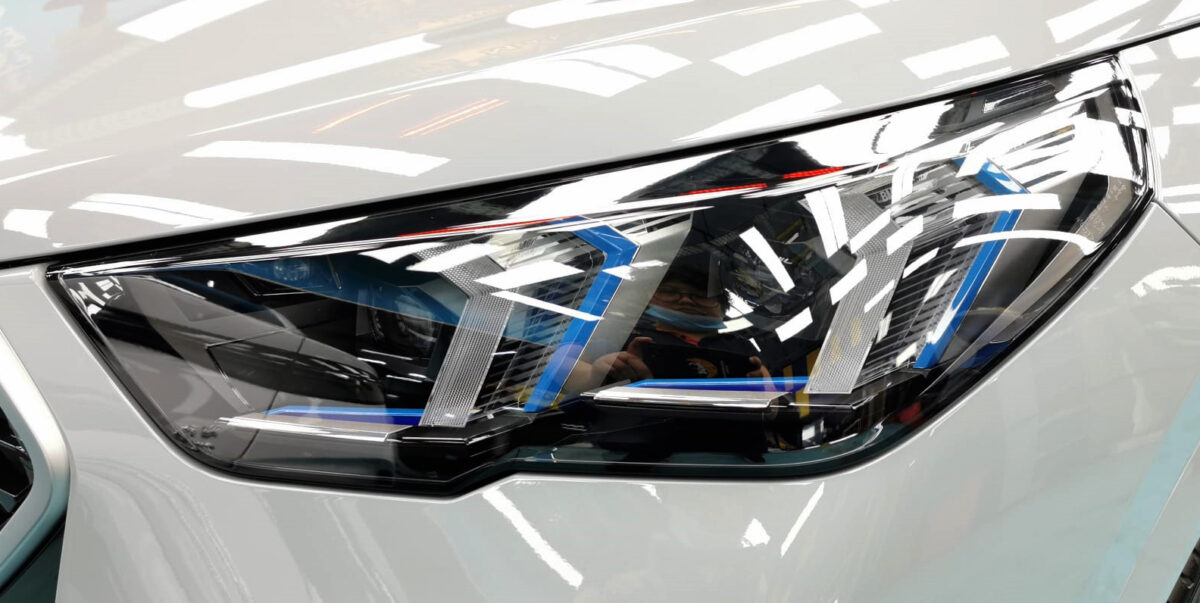 The X2's coated paintwork showing clean reflections.