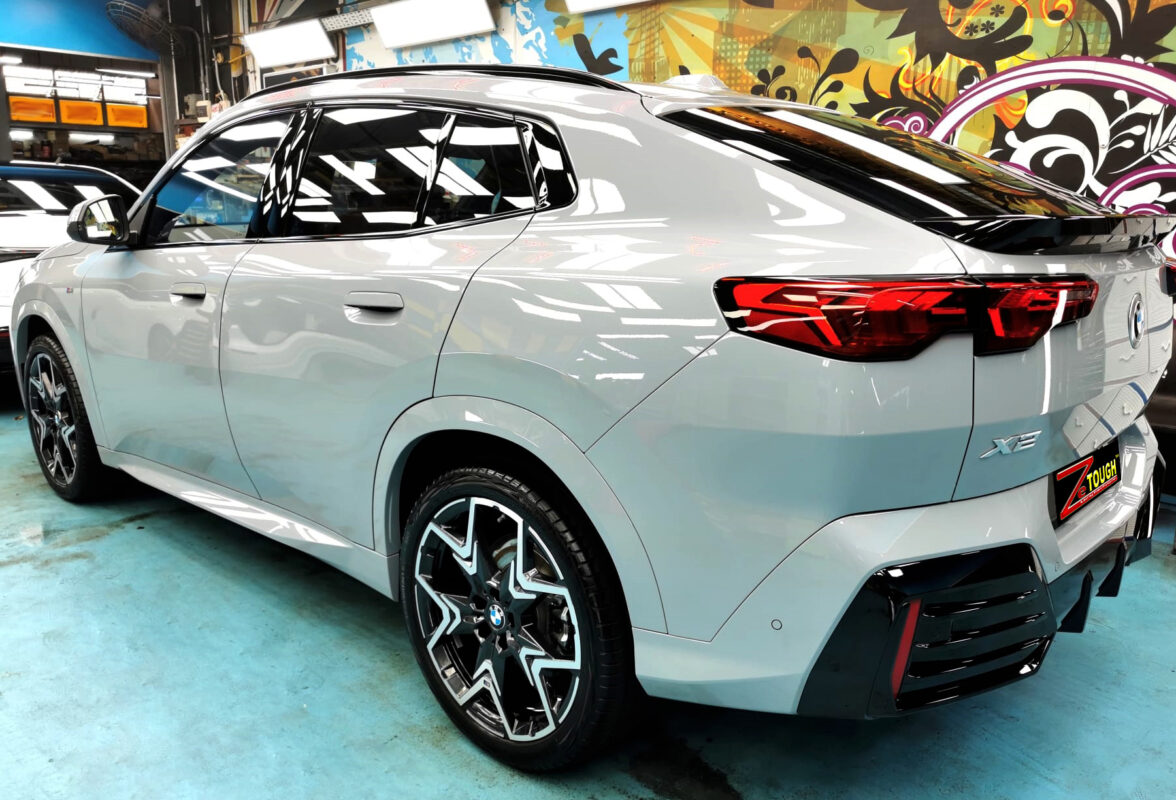 Rear quarter of the BMW X2, glossy and protected.