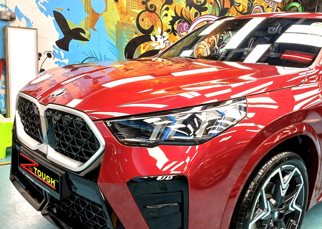 The BMW X2 from a side angle after the titanium coating.