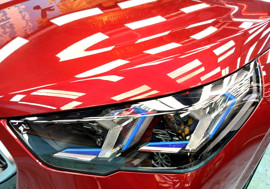 The X2's coated paintwork showing clean reflections.
