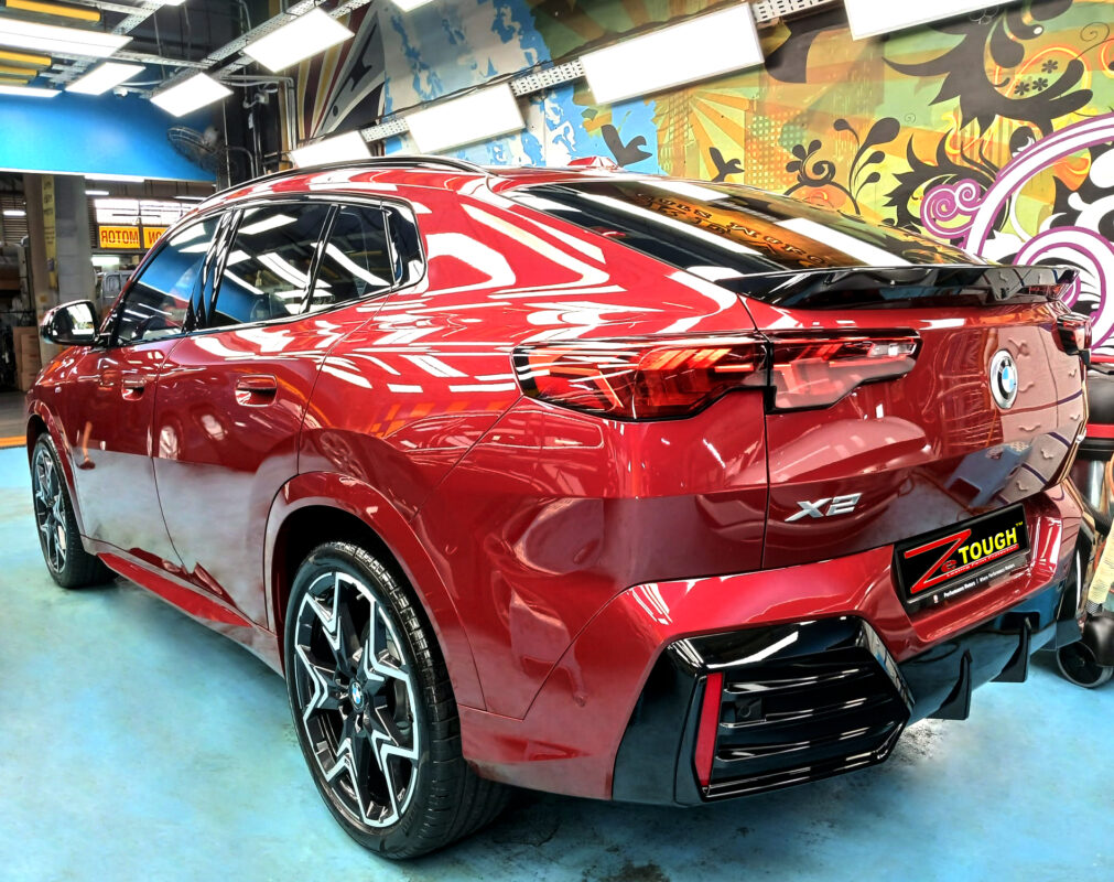 Front three-quarter view of the BMW X2 after coating.