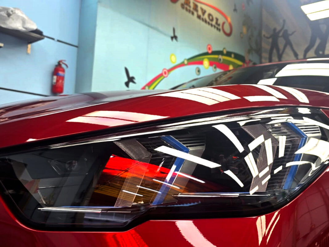 The X2's coated paintwork showing clean reflections.
