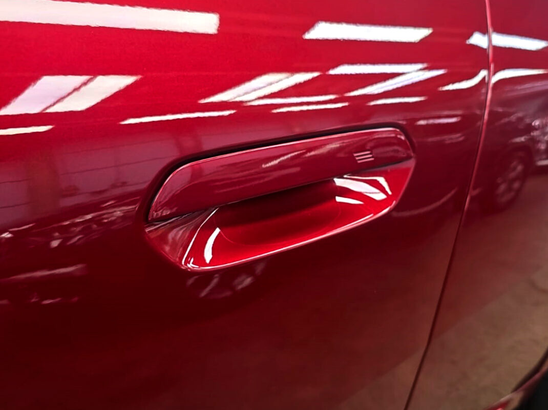 Front three-quarter view of the BMW X2 after coating.