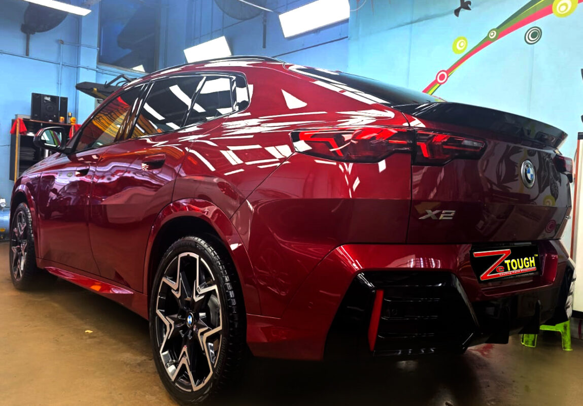 Rear quarter of the BMW X2, glossy and protected.