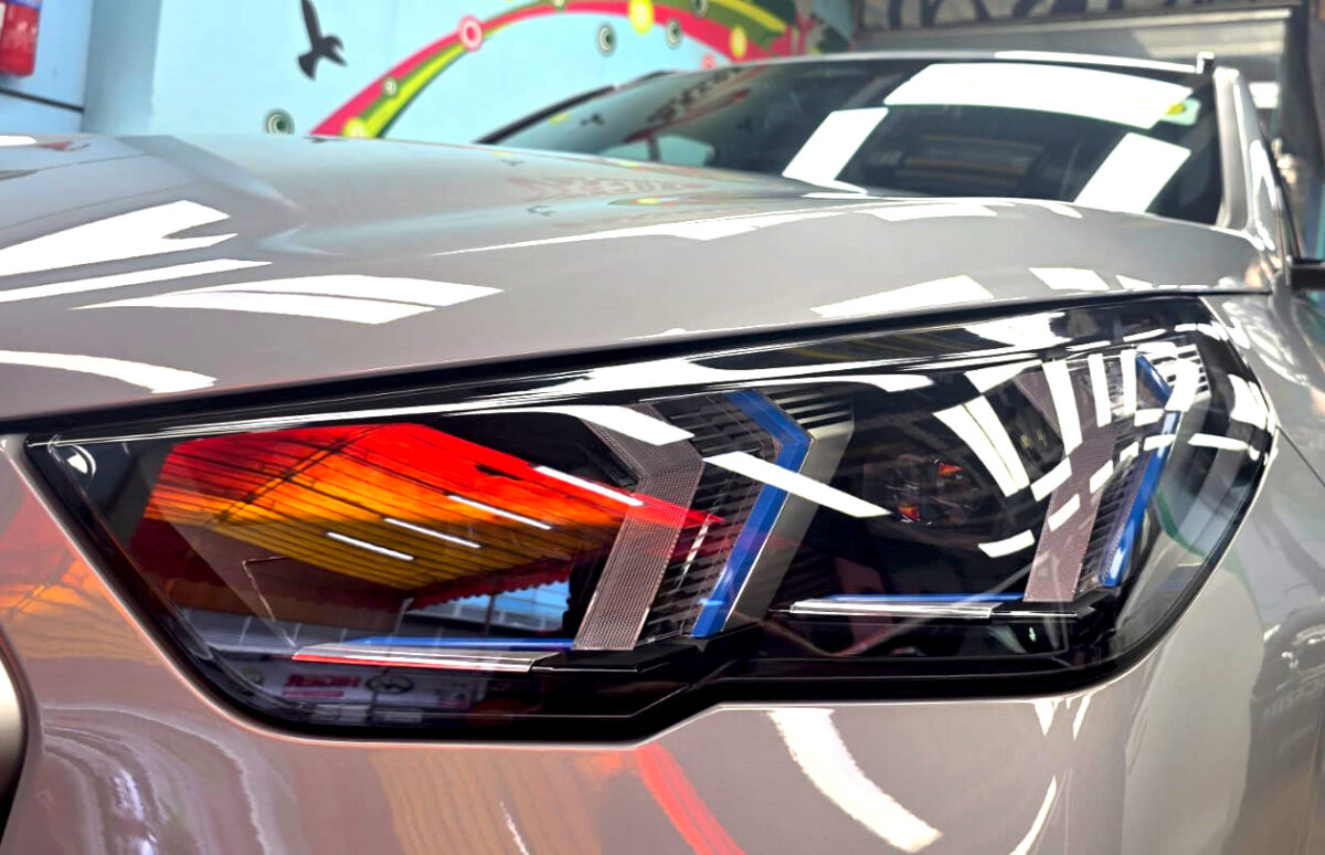 The X2's coated paintwork showing clean reflections.