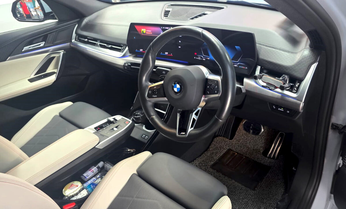 The BMW X2 parked in the workshop, freshly coated.