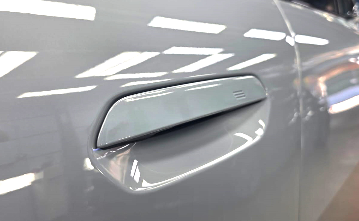Front three-quarter view of the BMW X2 after coating.