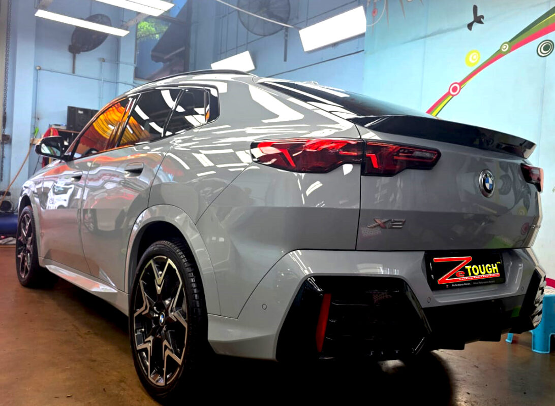 Rear quarter of the BMW X2, glossy and protected.