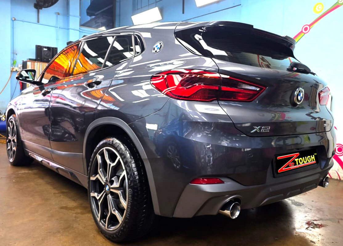 Rear quarter of the BMW X2, glossy and protected.