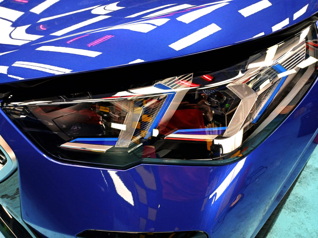 The X2's coated paintwork showing clean reflections.