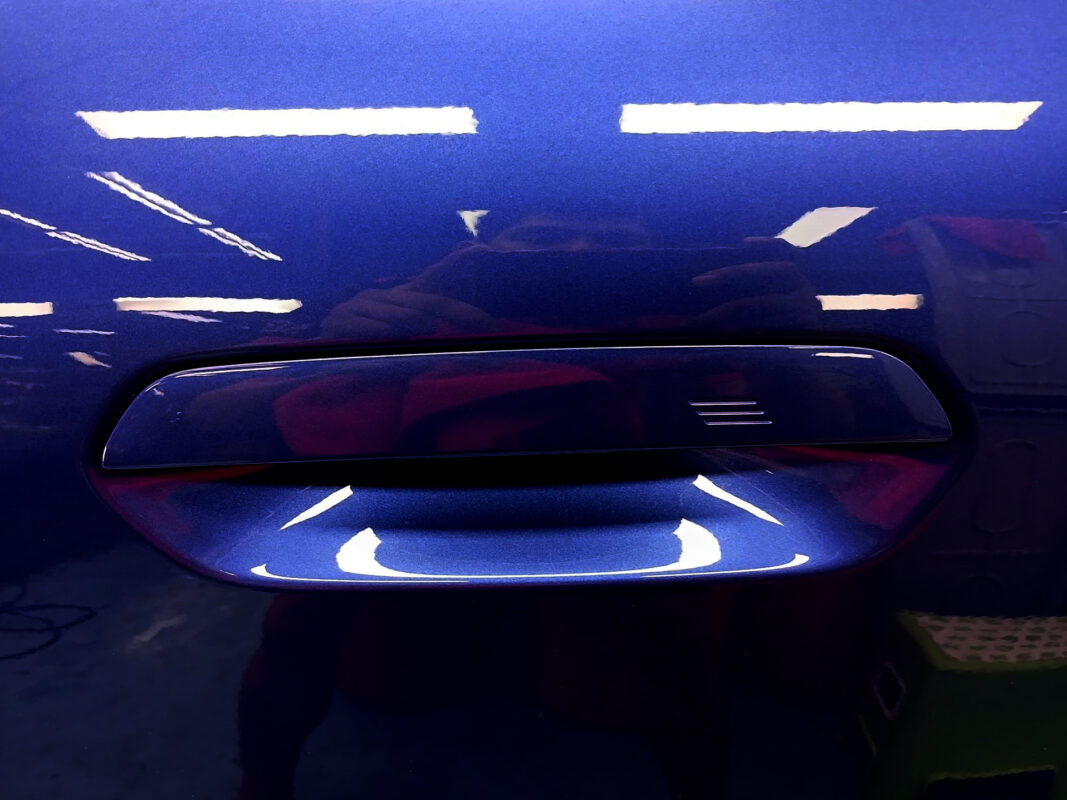 Front three-quarter view of the BMW X2 after coating.