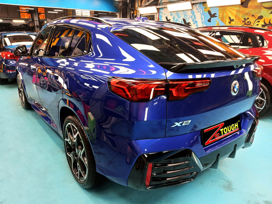 Rear quarter of the BMW X2, glossy and protected.
