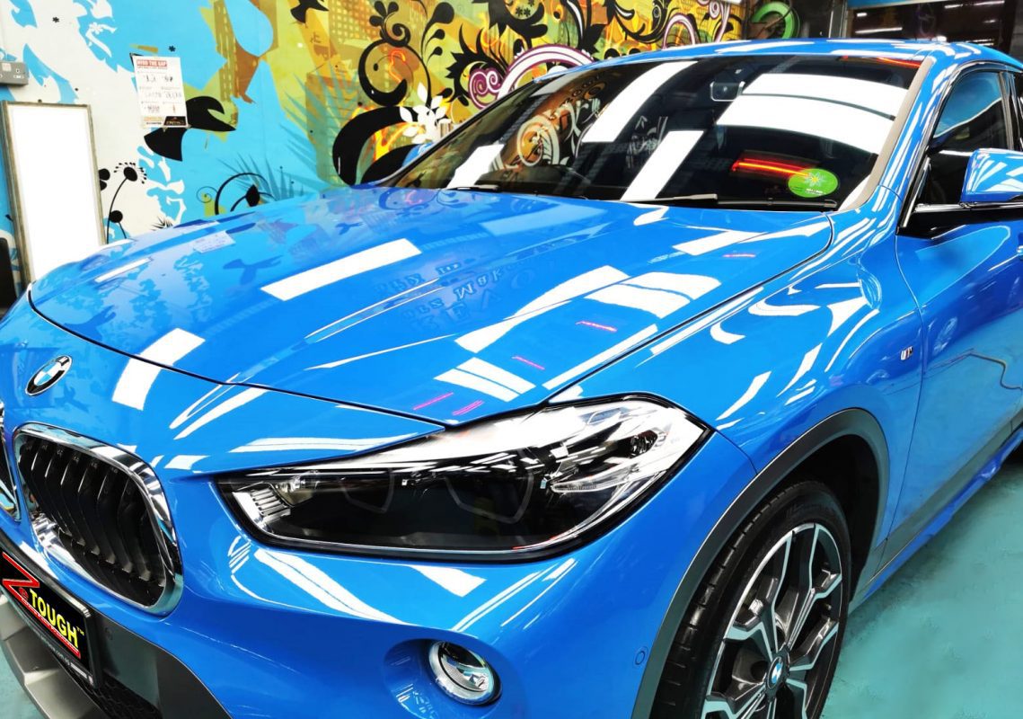 The BMW X2 from a side angle after the titanium coating.
