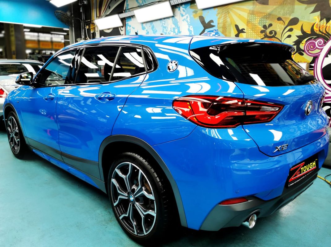 Rear quarter of the BMW X2, glossy and protected.