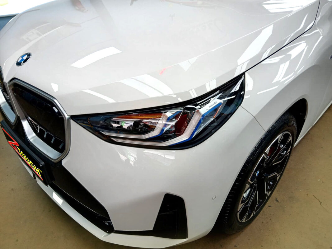 The BMW X3 from a side angle after the ceramic coating.