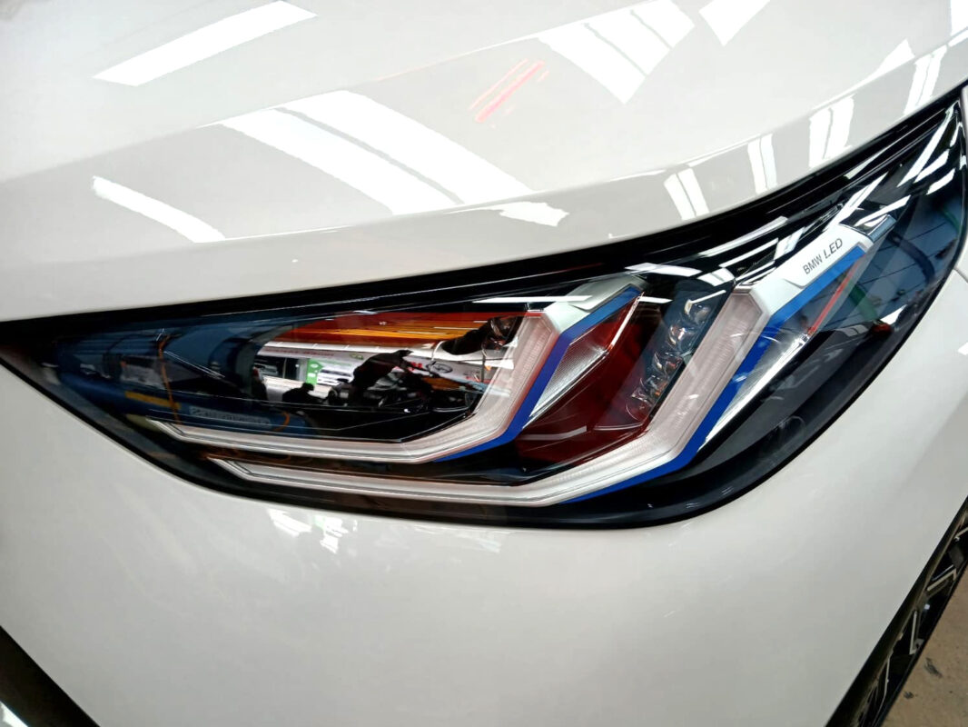 The X3's coated paintwork showing clean reflections.