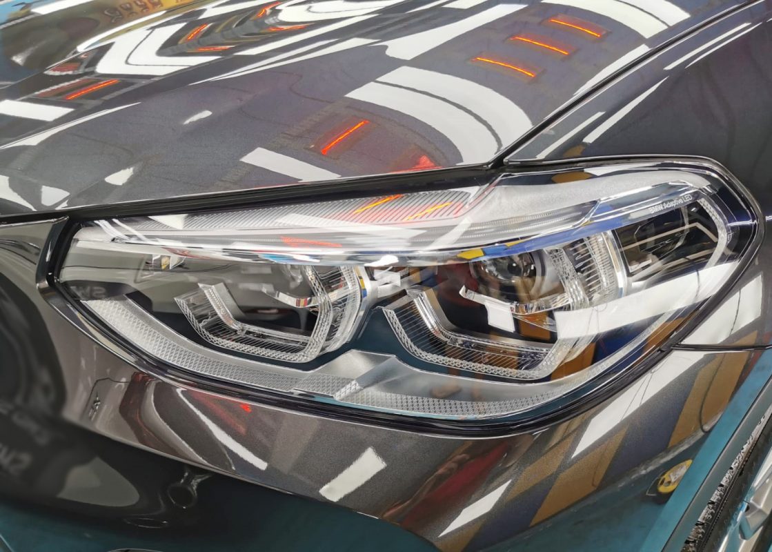 The X3's coated paintwork showing clean reflections.