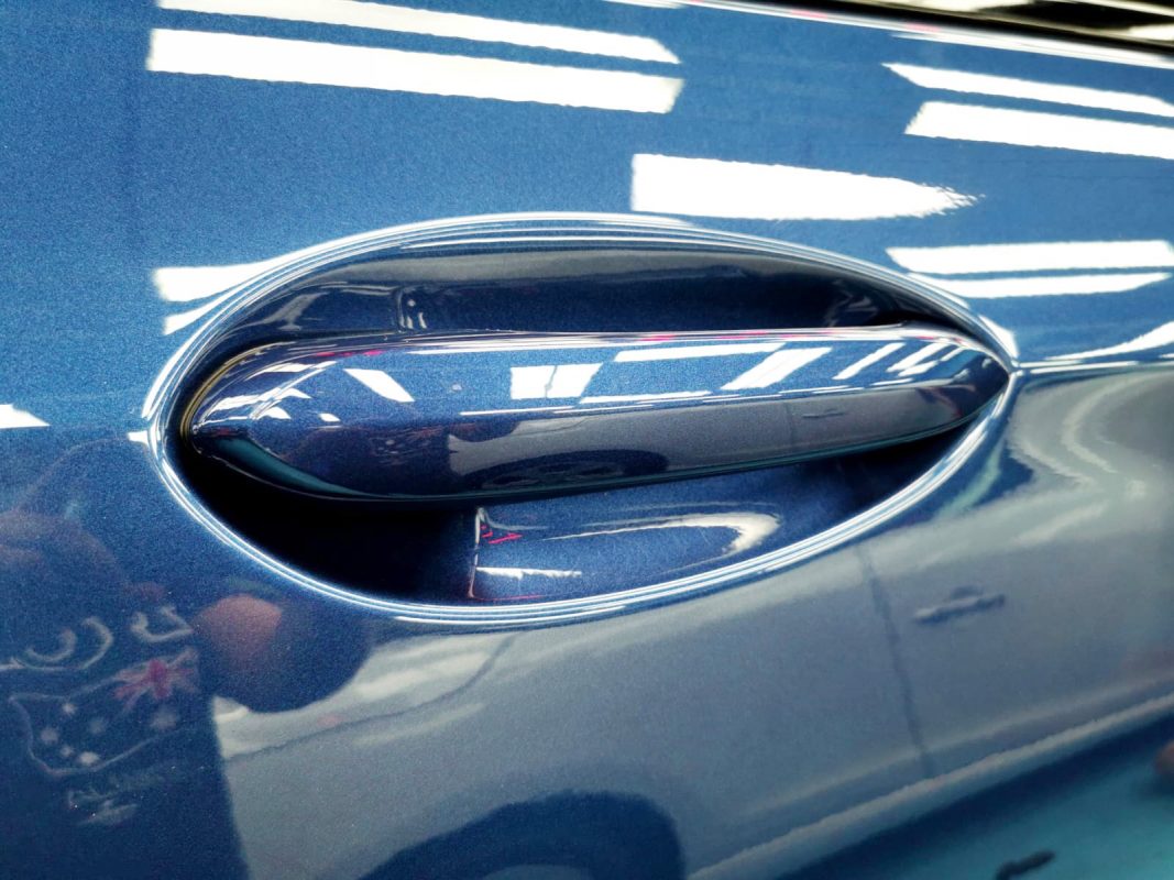 Front three-quarter view of the BMW X3 after coating.