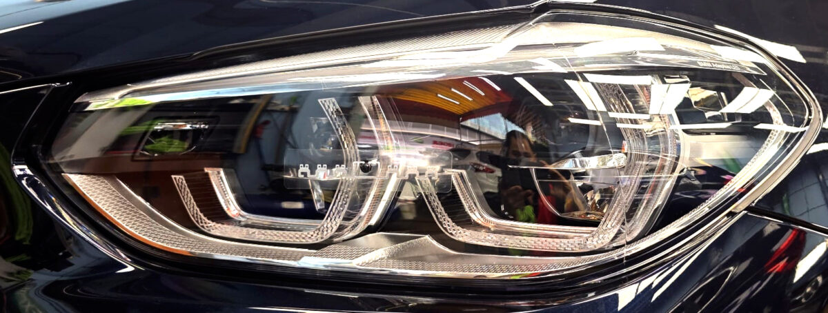 The X3's coated paintwork showing clean reflections.