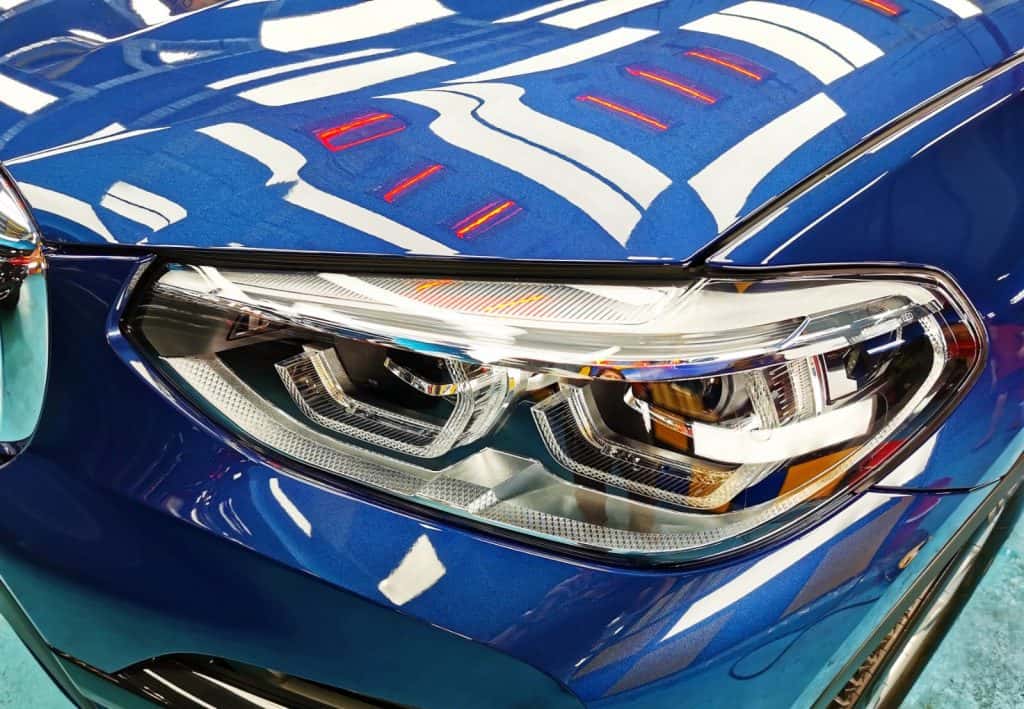 The X3's coated paintwork showing clean reflections.