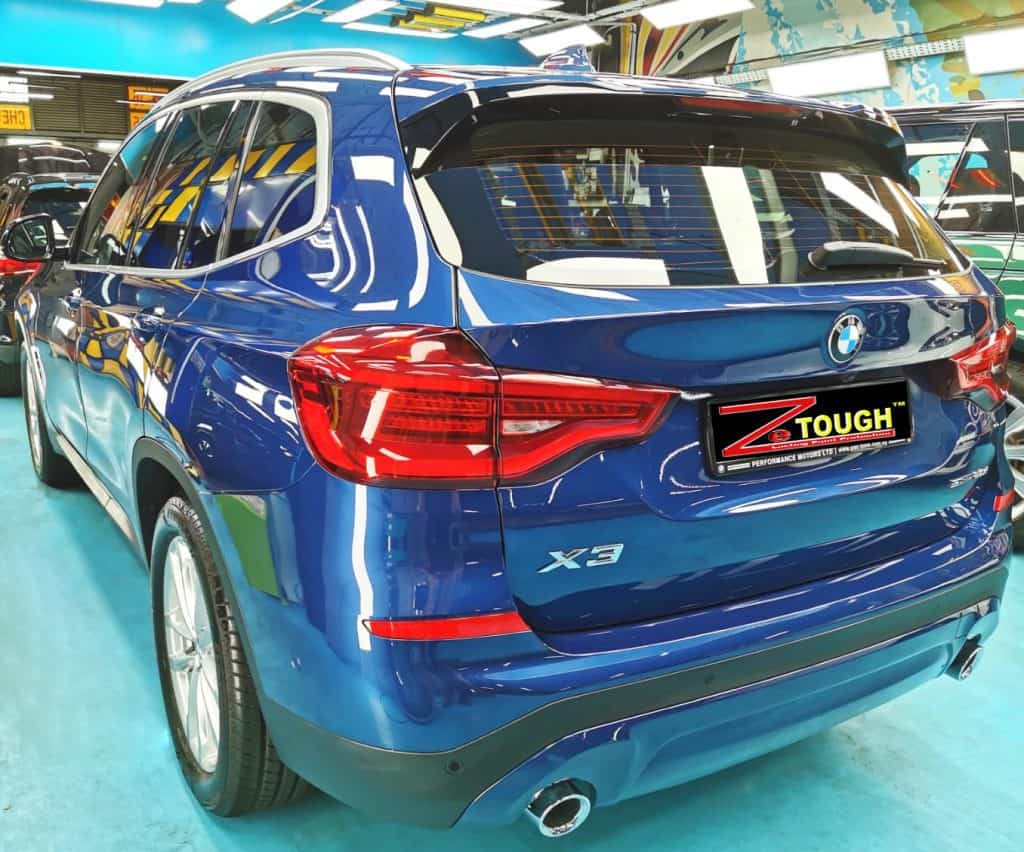 Rear quarter of the BMW X3, glossy and protected.