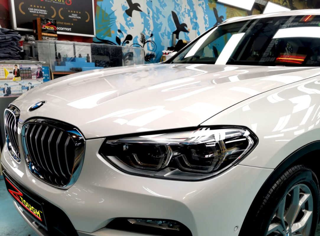 The BMW X3 from a side angle after the ceramic coating.