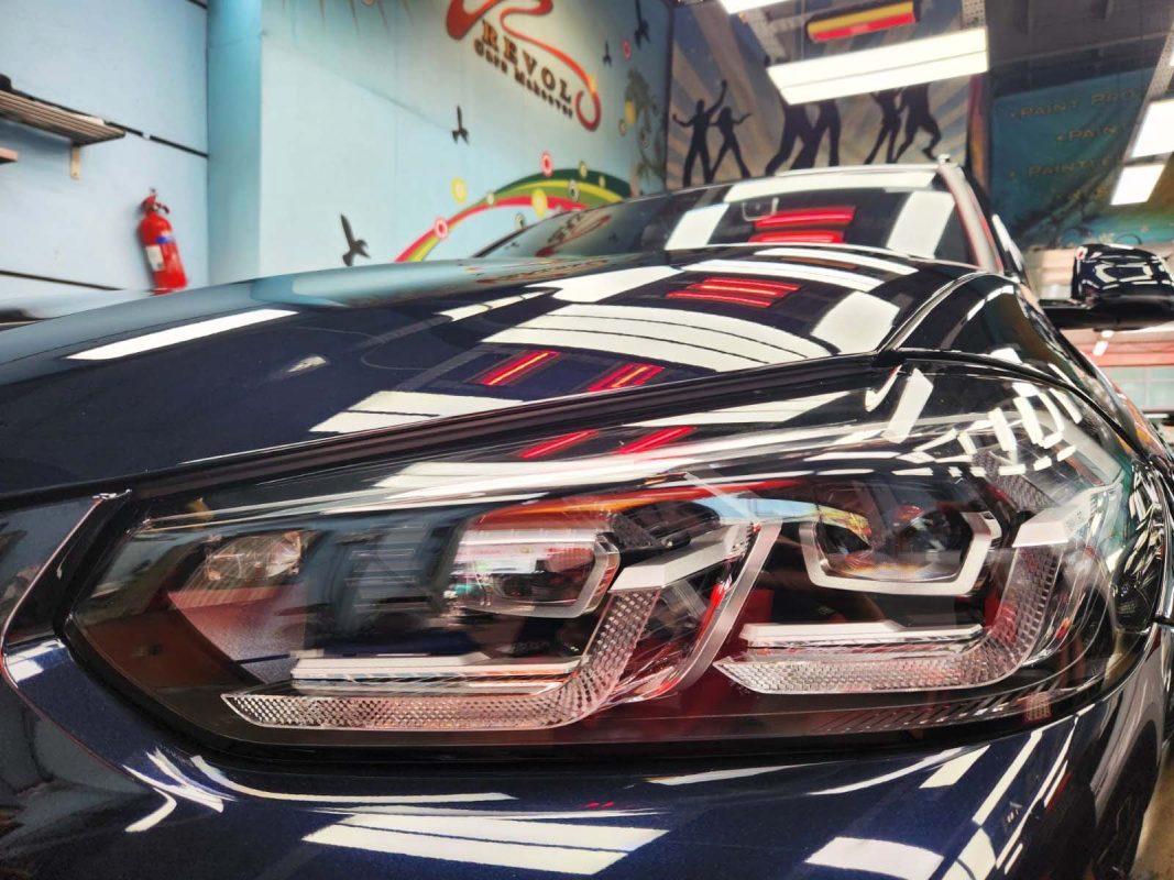 The X3's coated paintwork showing clean reflections.