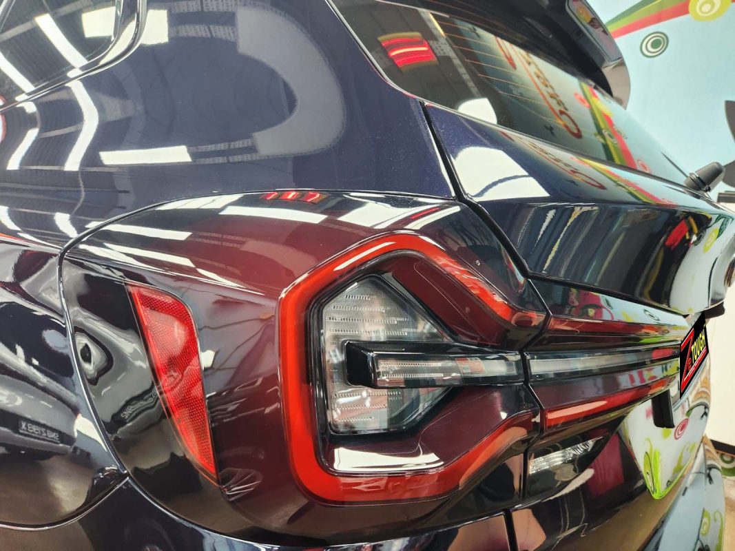 Rear quarter of the BMW X3, glossy and protected.