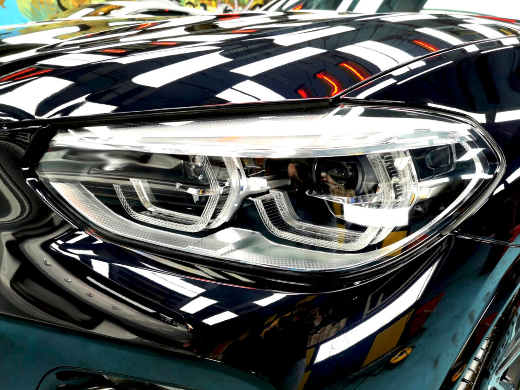 The X3's coated paintwork showing clean reflections.