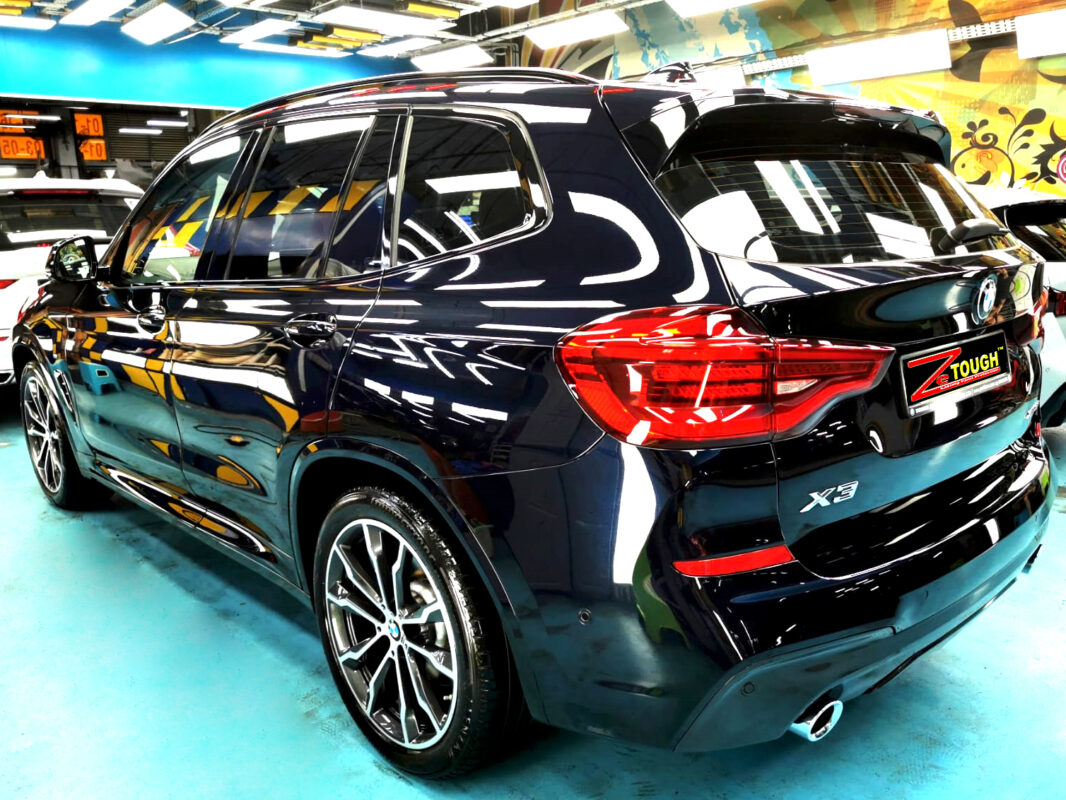 Rear quarter of the BMW X3, glossy and protected.