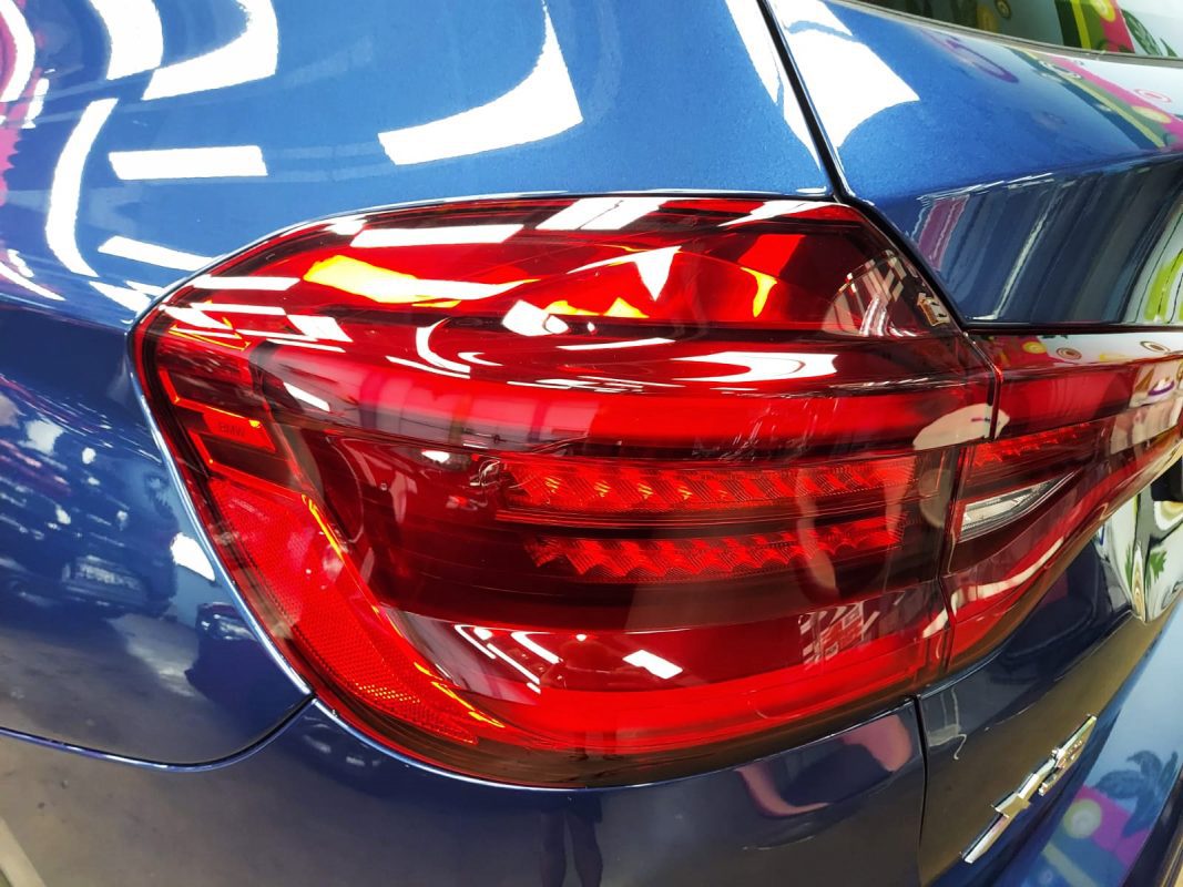 Rear quarter of the BMW X3, glossy and protected.
