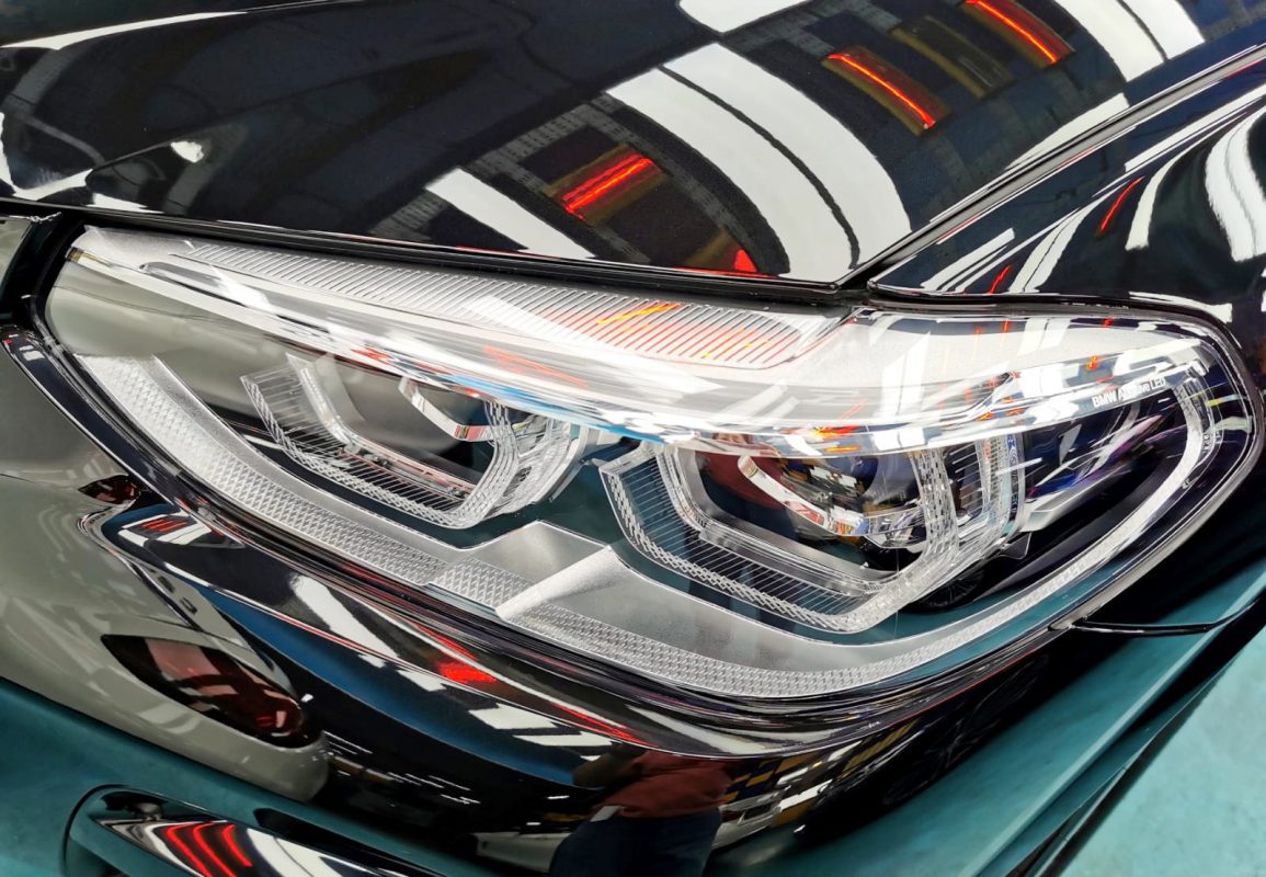 The X3's coated paintwork showing clean reflections.