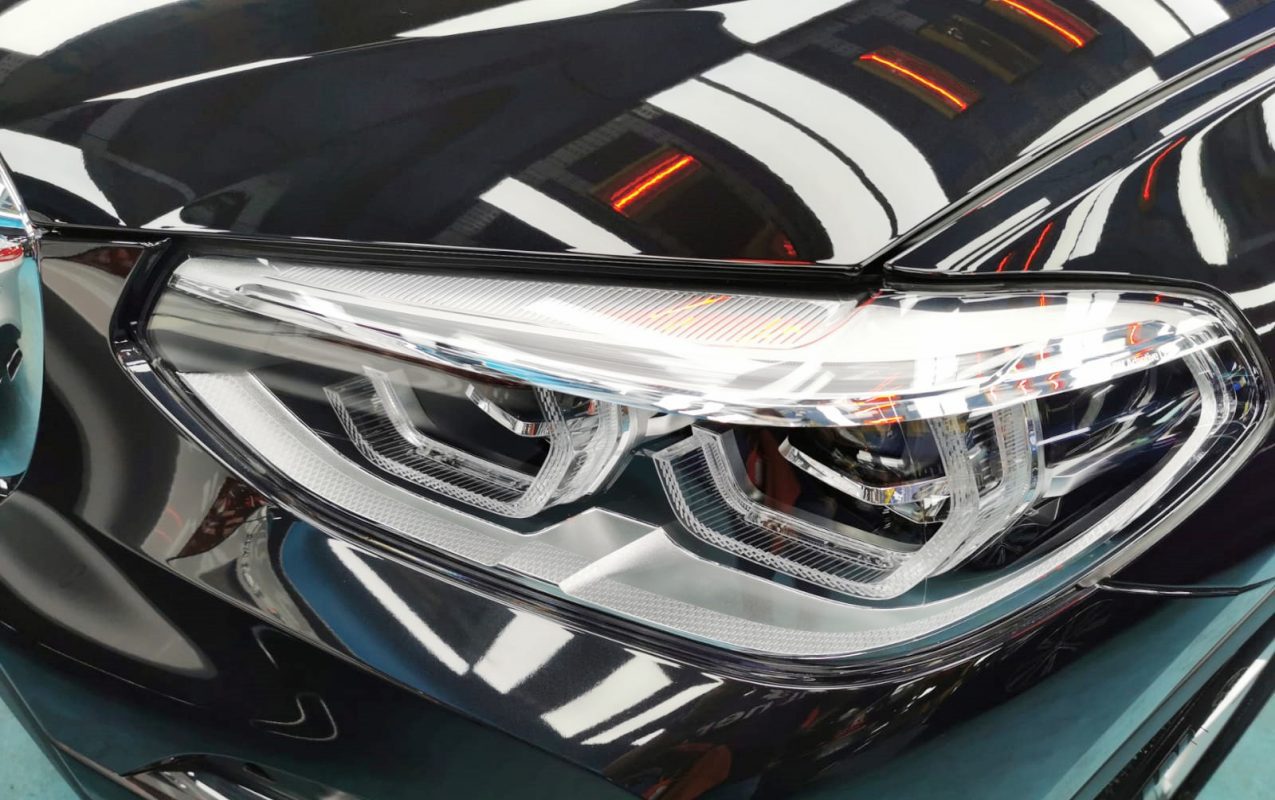 The X3's coated paintwork showing clean reflections.