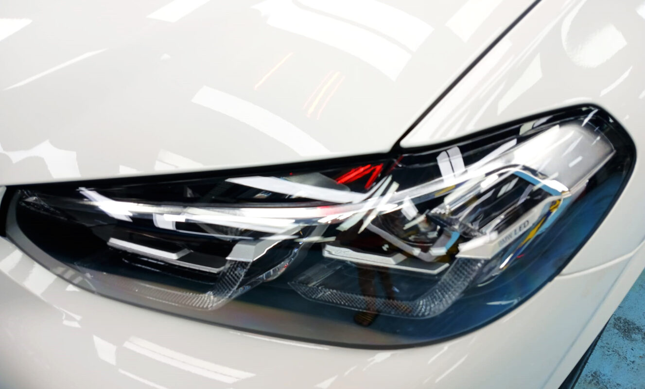 The X4's coated paintwork showing clean reflections.