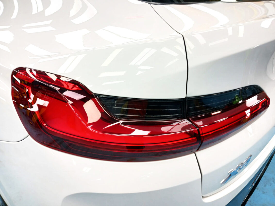Rear quarter of the BMW X4, glossy and protected.