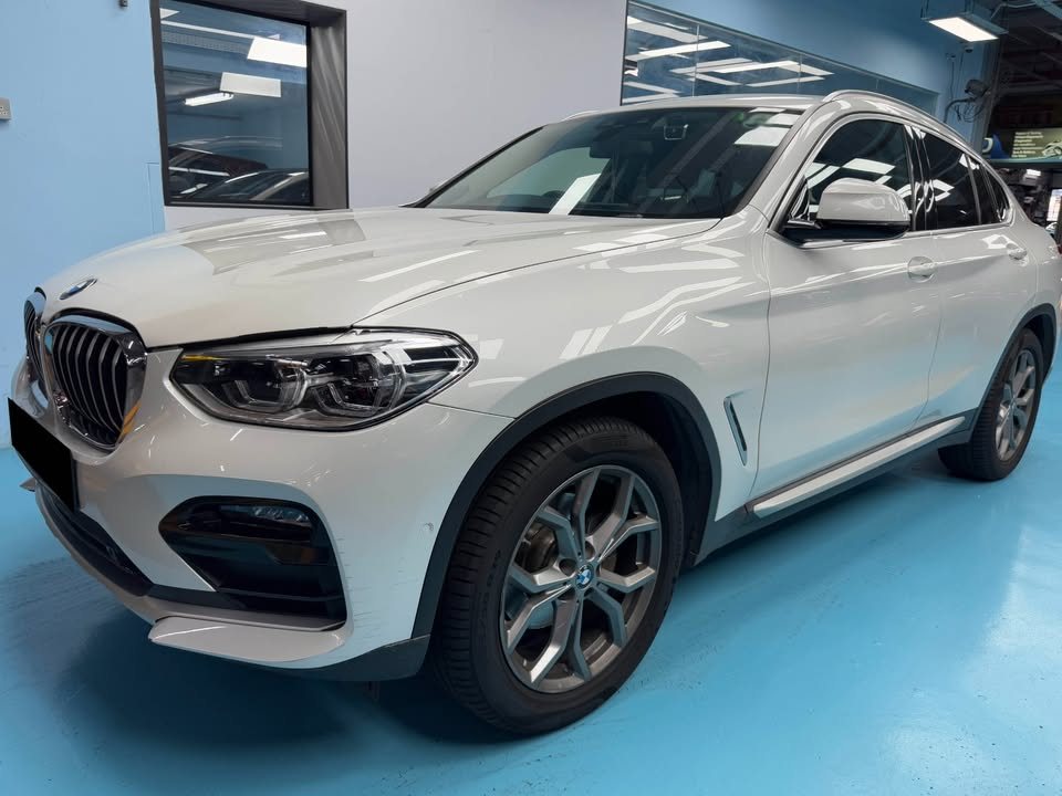The white BMW X4 from the front three-quarter as it arrived.