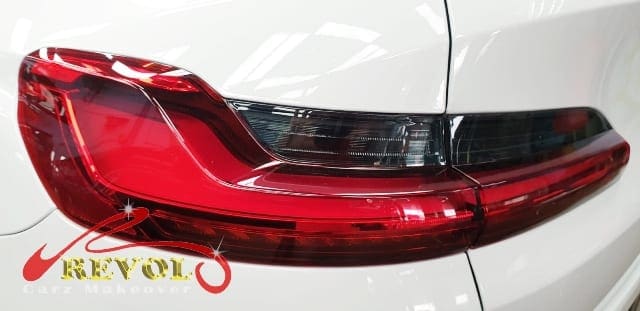 Rear quarter of the BMW X4 M40i, glossy and protected.