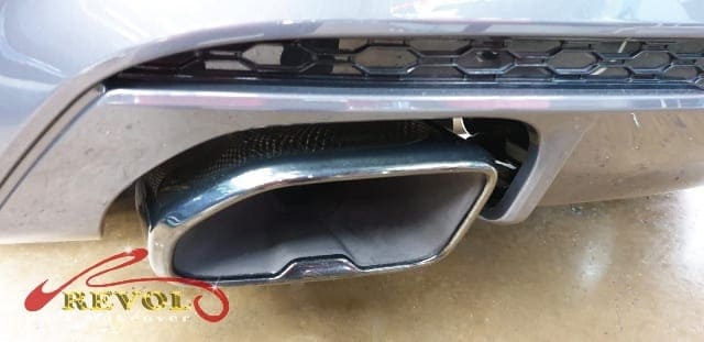 The coated bonnet of the BMW X4 M40i under workshop lighting.