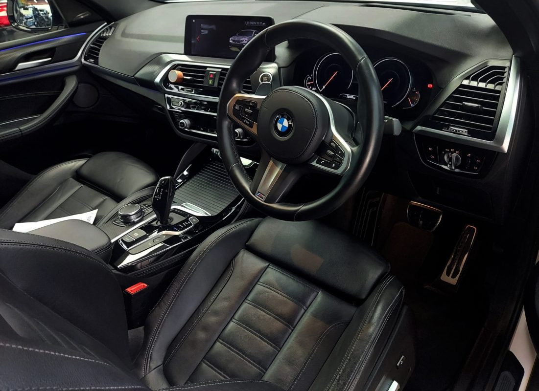 Front three-quarter view of the BMW X4 after coating.