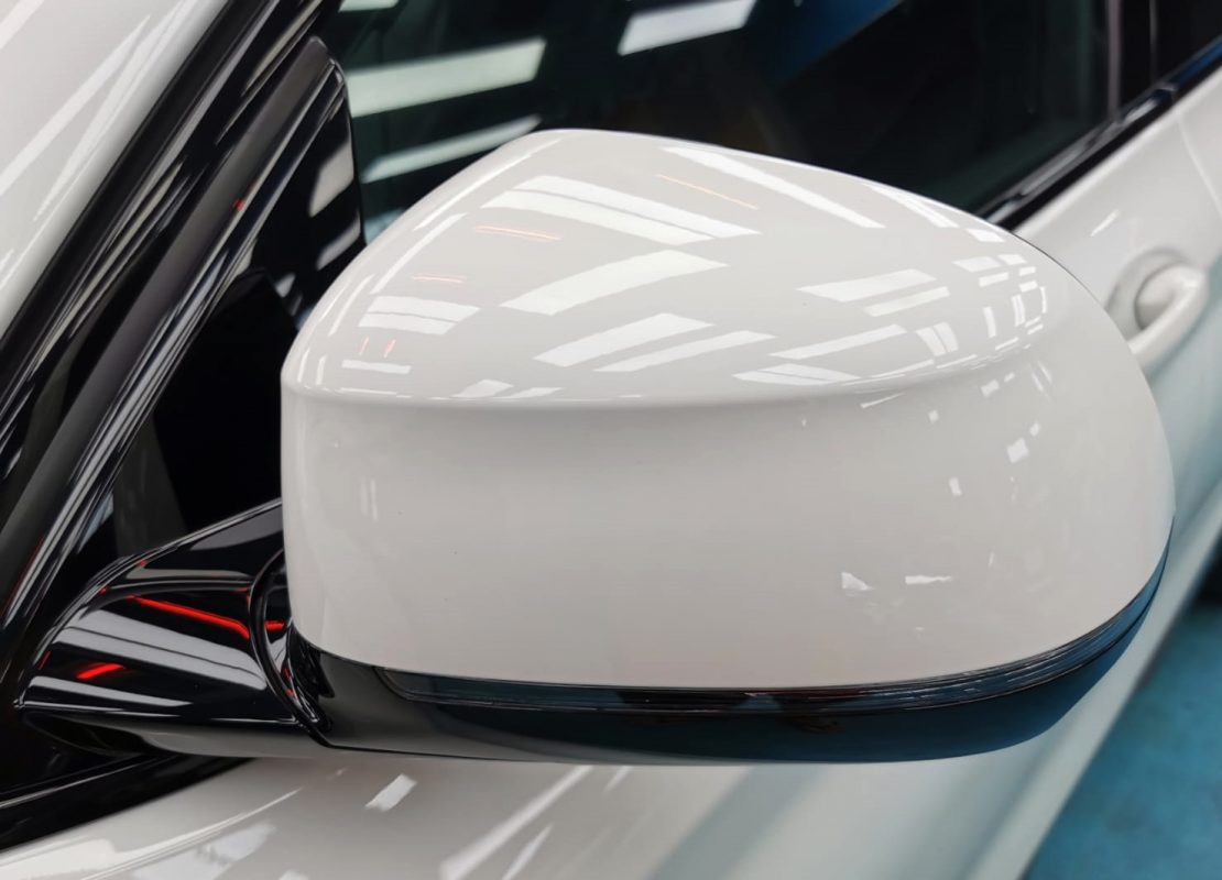 Front three-quarter view of the BMW X4 after coating.
