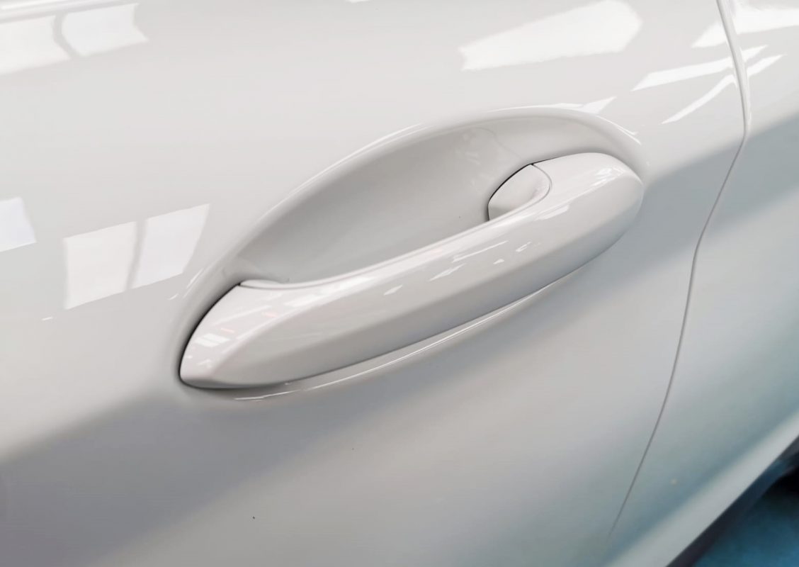 Rear quarter of the BMW X4, glossy and protected.