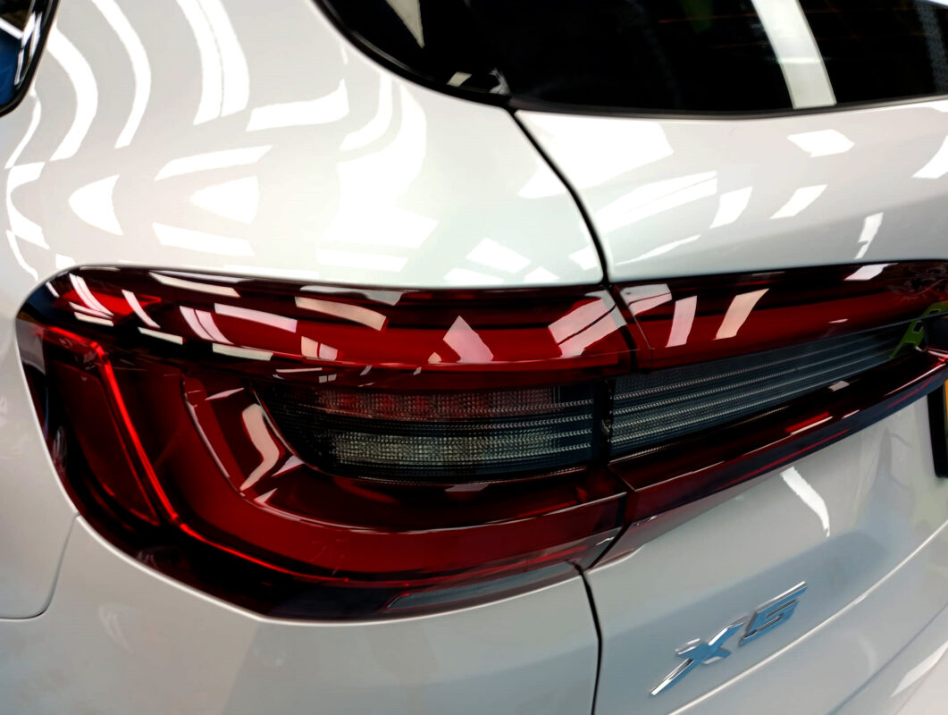 Rear quarter of the BMW X5, glossy and protected.