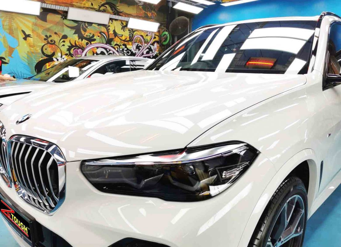 The BMW X5 from a side angle after the titanium coating.