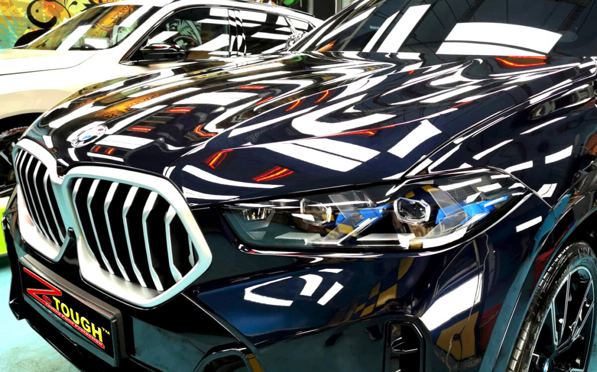 The BMW X6 from a side angle after the titanium coating.